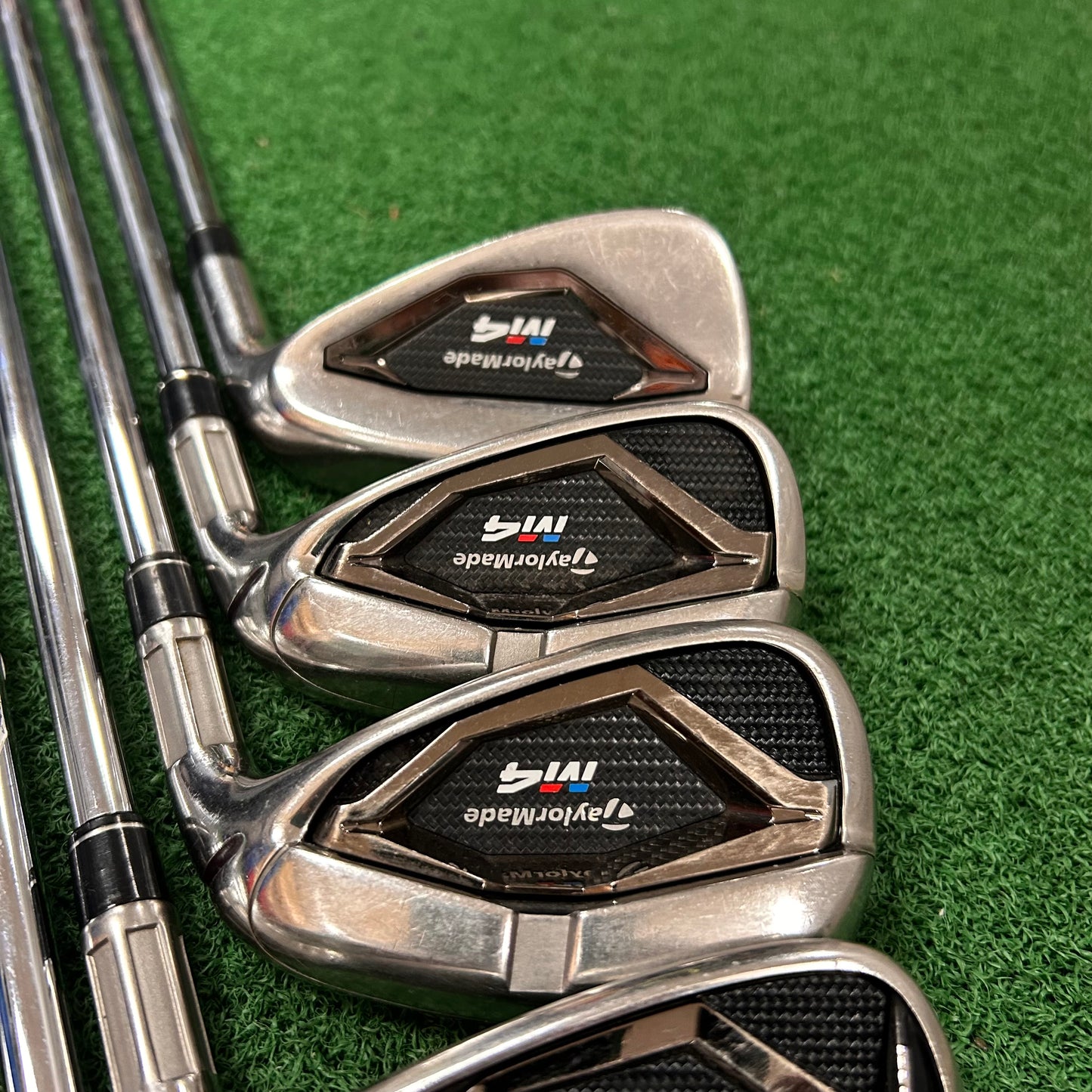 RH Taylormade M4 Iron Set (5-PW, AW). Stiff Flex.